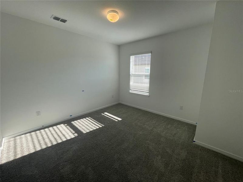 Spacious, unfurnished interior of a new home in Isles at BayView, Parrish (Image 12).