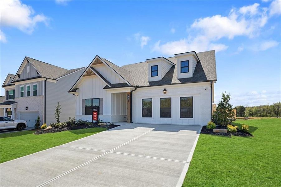 Front exterior of a new home in Garland Meadows, Cartersville, GA, highlighting curb appeal (Image 2). Front exterior of a new home in Garland Meadows, Cartersville, GA, highlighting curb appeal (Image 2).