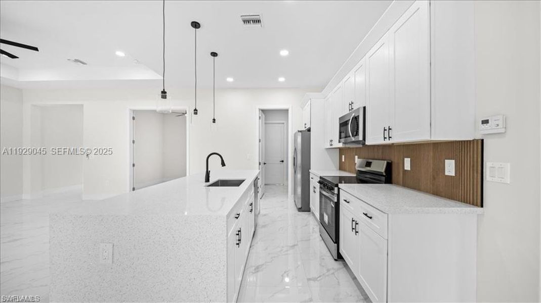 Furnished interior view inside a new home in , Lehigh Acres (Image 9). Furnished interior view inside a new home in , Lehigh Acres (Image 9).