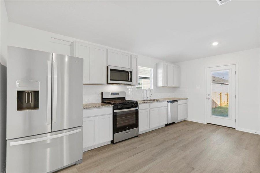 Furnished interior view inside a new home in Waterstone Crossing, Kyle (Image 11). Furnished interior view inside a new home in Waterstone Crossing, Kyle (Image 11).