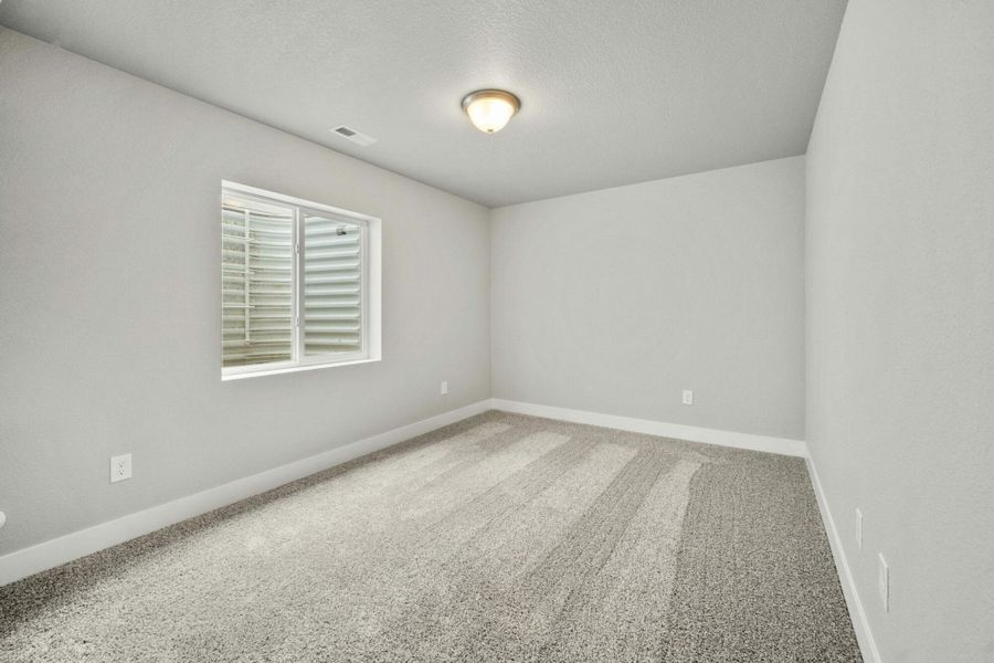 Representative unfurnished interior of a home built from the Balsam by View Homes in Aspen Ranch, Fountain (Image 24).