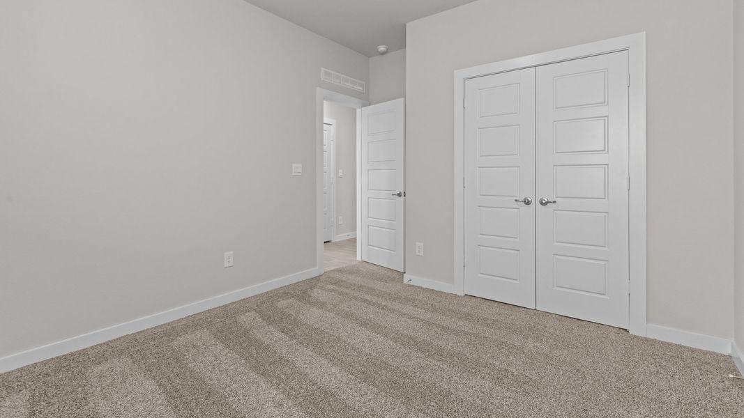 Representative unfurnished interior of a home built from the LAKEMONT by D.R. Horton in Northwest Passage, Midland (Image 20). Representative unfurnished interior of a home built from the LAKEMONT by D.R. Horton in Northwest Passage, Midland (Image 20).