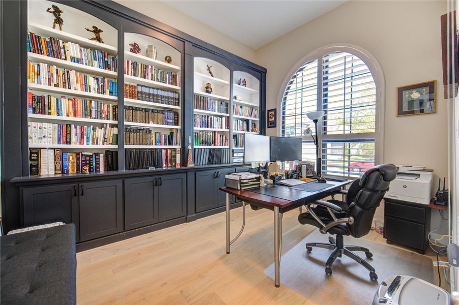 Refined Home Office Featuring a Distinguished Library Setting