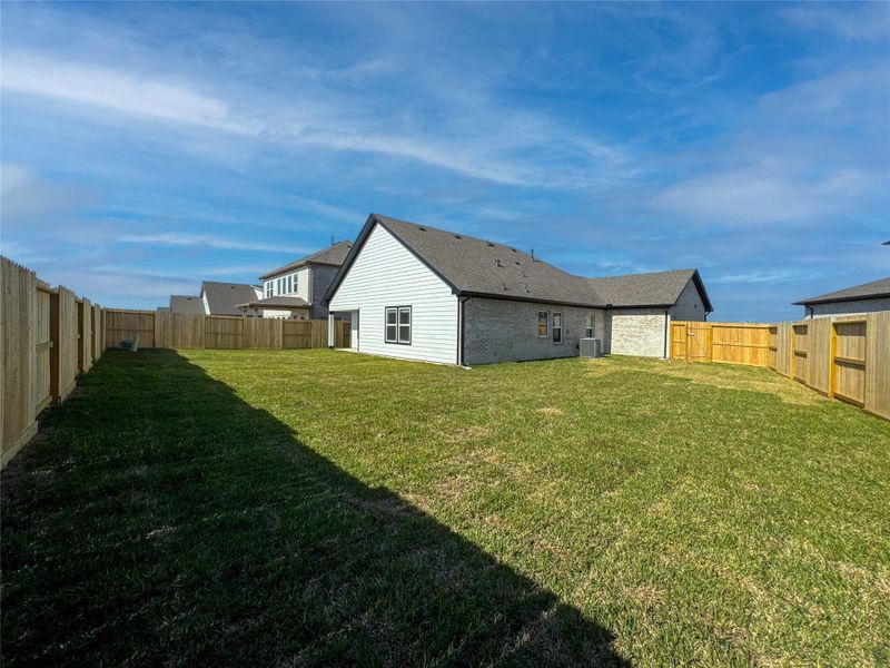 Exterior details and patio area of a home in , Manvel (Image 19).