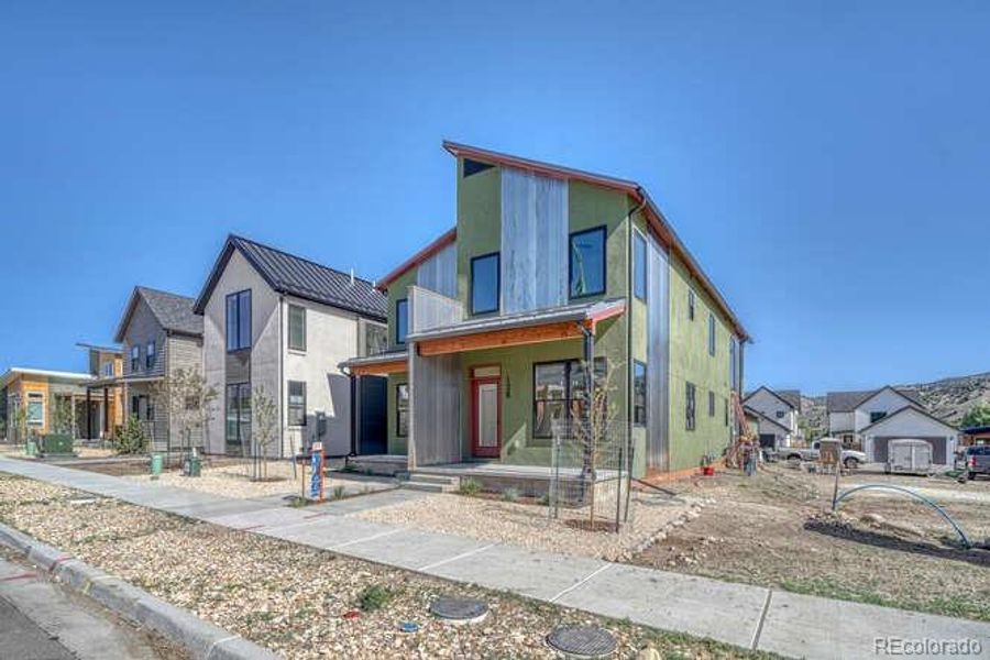 Front exterior of a new home in , Salida, CO, highlighting curb appeal (Image 17). Front exterior of a new home in , Salida, CO, highlighting curb appeal (Image 17).