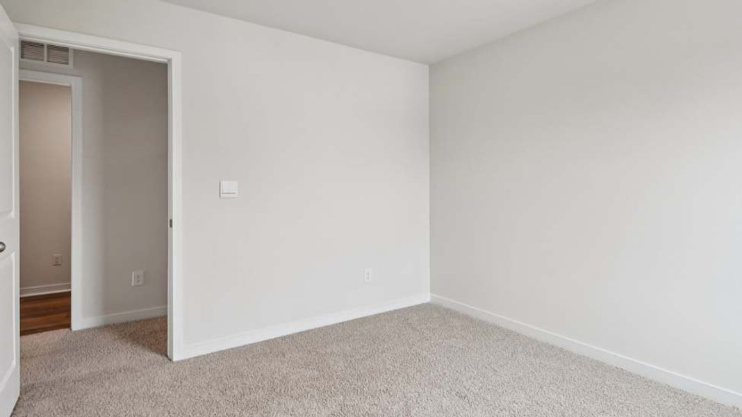 Spacious, unfurnished interior of a new home in Reedy Creek Preserve, Charlotte (Image 25).