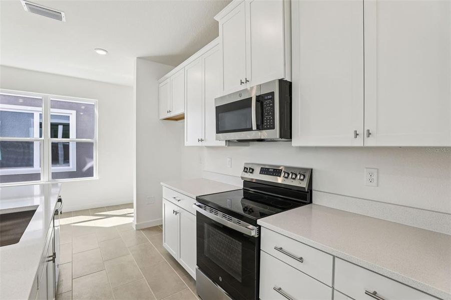 Furnished interior view inside a new home in Trinity Place, St. Cloud (Image 15). Furnished interior view inside a new home in Trinity Place, St. Cloud (Image 15).