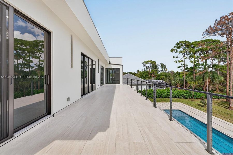 Exterior details and patio area of a home in , Parkland (Image 29).