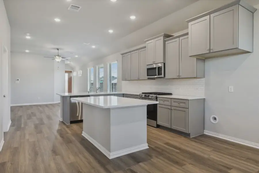 Representative furnished interior of a home built from the Tucson by Chesmar Homes in Solterra Texas, Mesquite (Image 4).