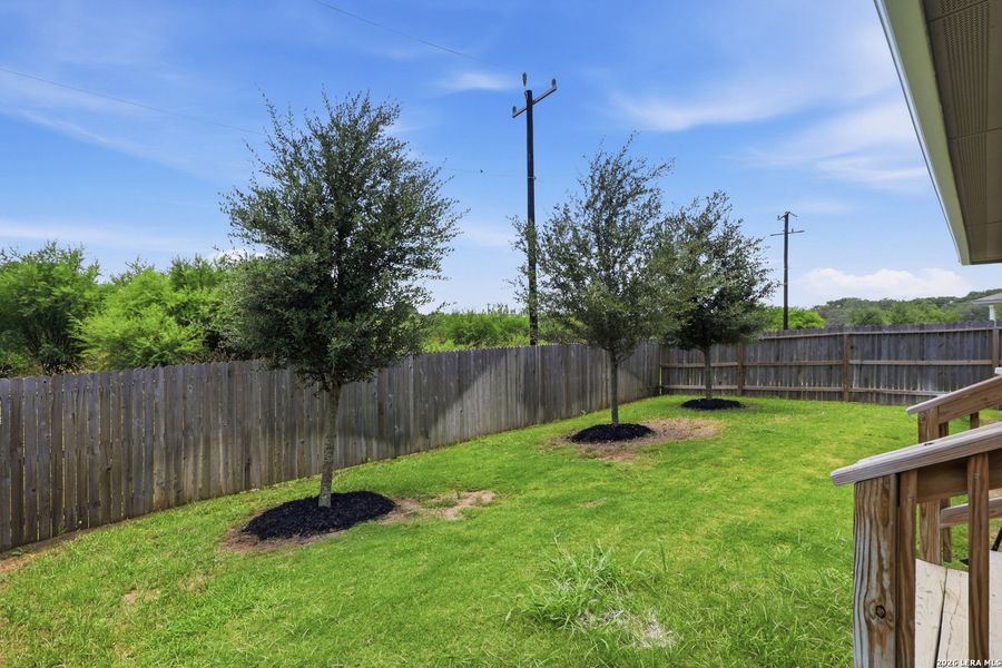 Exterior details and patio area of a home in Redbird Ranch, San Antonio (Image 29).