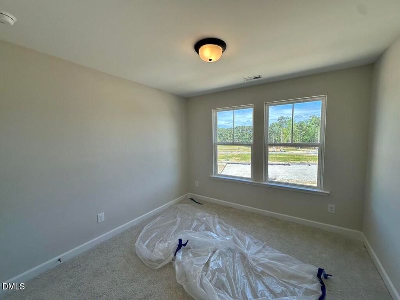 In-progress construction of a new home in Forestville Yard Townhomes, Knightdale, NC (Image 16).