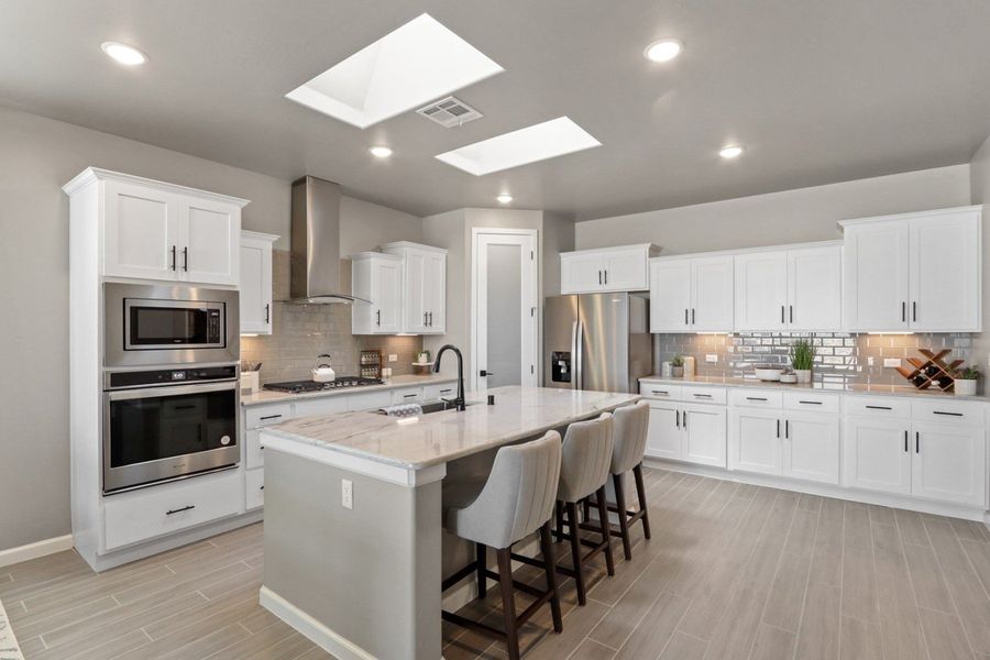 Representative furnished interior of a home built from the Pershing by Hakes Brothers in Paseo Del Este, El Paso (Image 4).