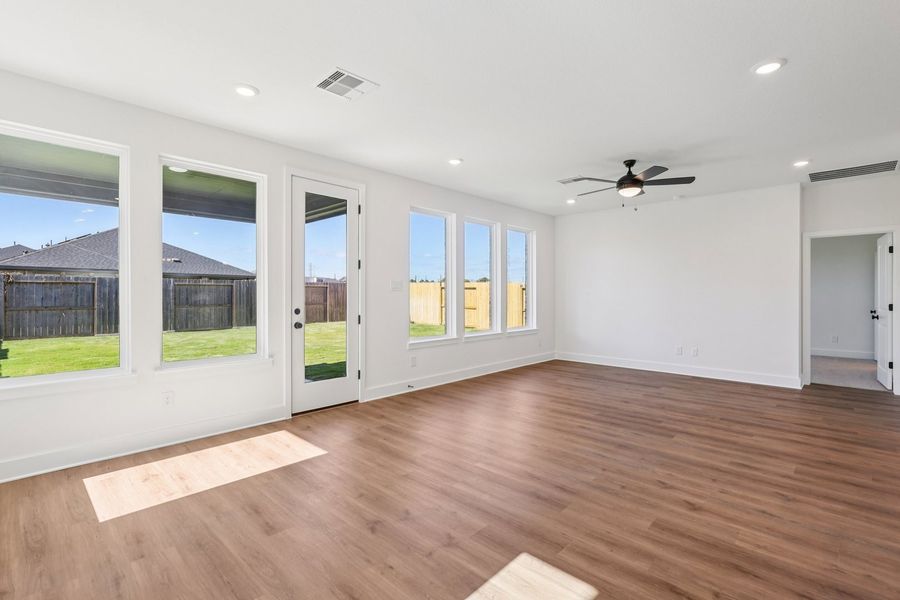 Spacious, unfurnished interior of a new home in The Canopies, Splendora (Image 3).