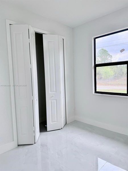 Spacious, unfurnished interior of a new home in , Lehigh Acres (Image 15).