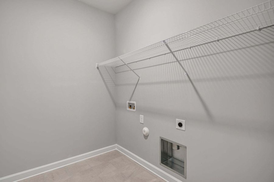 Representative unfurnished interior of a home built from the Garland by Caviness & Cates Communities in Bartlett Manor, Youngsville (Image 267). Representative unfurnished interior of a home built from the Garland by Caviness & Cates Communities in Bartlett Manor, Youngsville (Image 267).