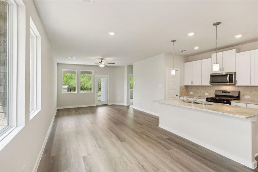 Kitchen is open to the dining an living room