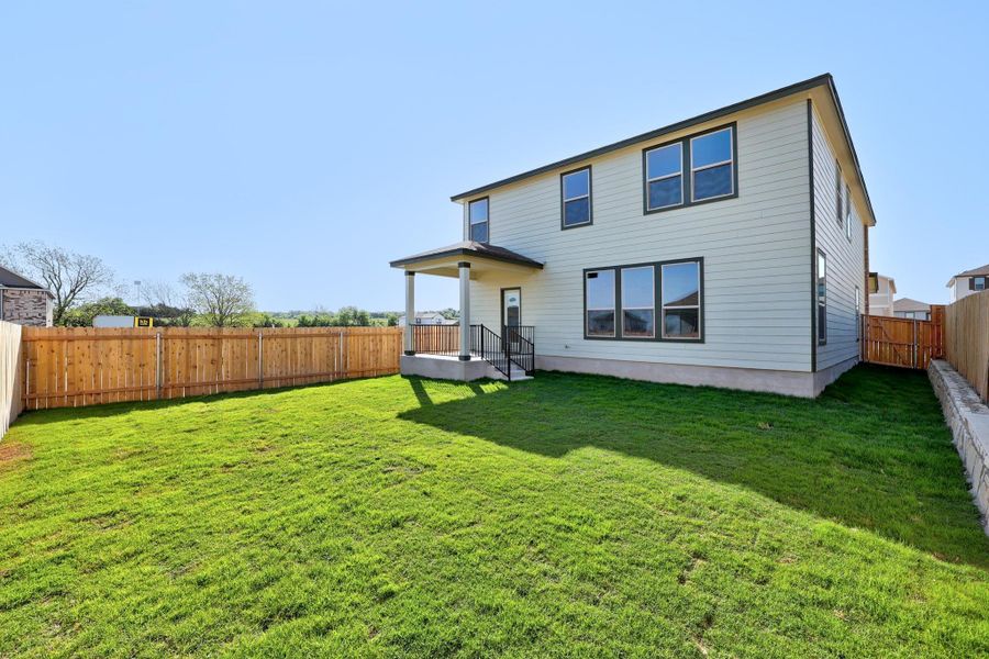 Front exterior of a new home in Sonterra - Cool Water, Jarrell, TX, highlighting curb appeal (Image 23).