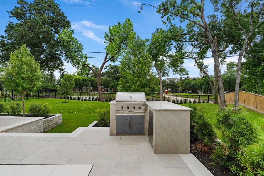 Outdoor grill area set up for your pool parties - all details were thought of