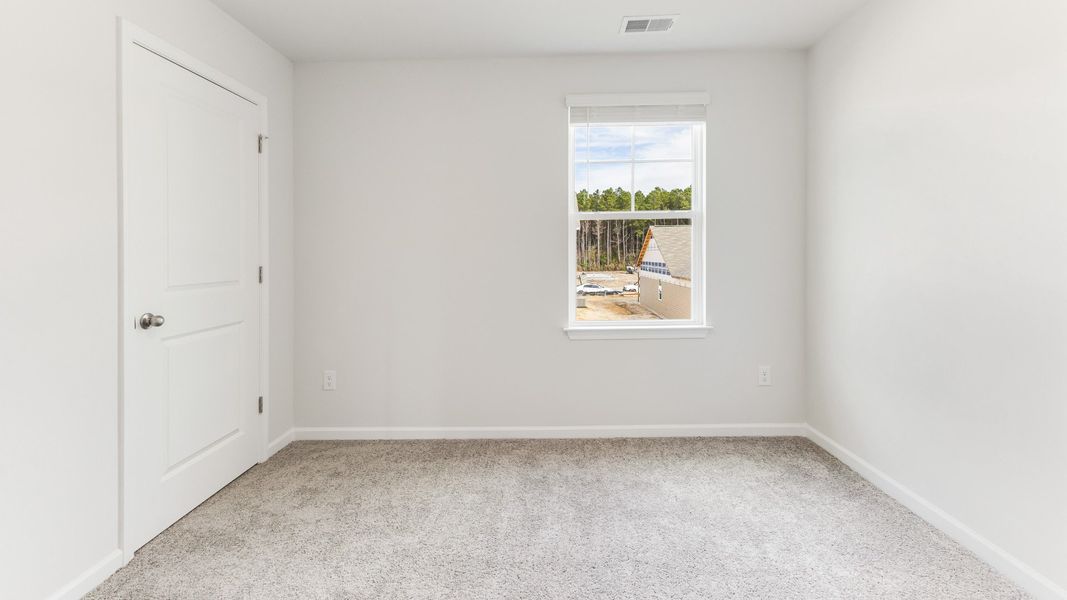 Representative unfurnished interior of a home built from the HAYDEN by D.R. Horton in Sidbury Station, Castle Hayne (Image 24).