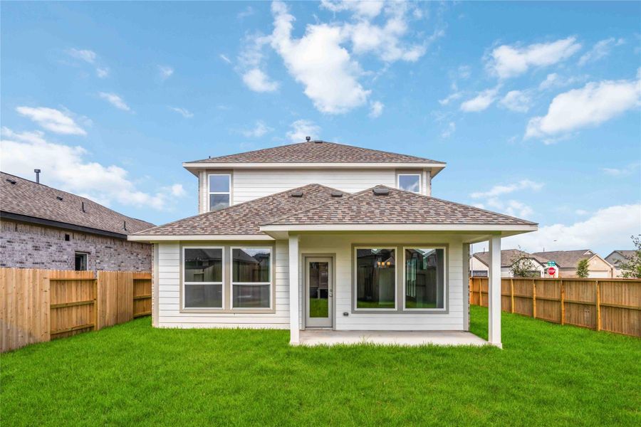 Exterior details and patio area of a home in Sunterra 40, Katy (Image 3).