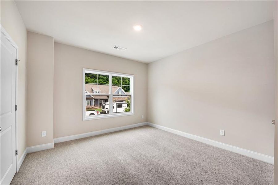 Spacious, unfurnished interior of a new home in Hidden Fields, Hoschton (Image 41).