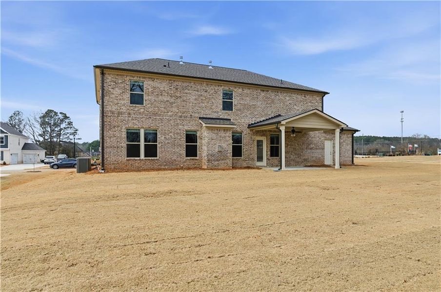 Exterior details and patio area of a home in Cambria at Traditions, Hampton (Image 21).
