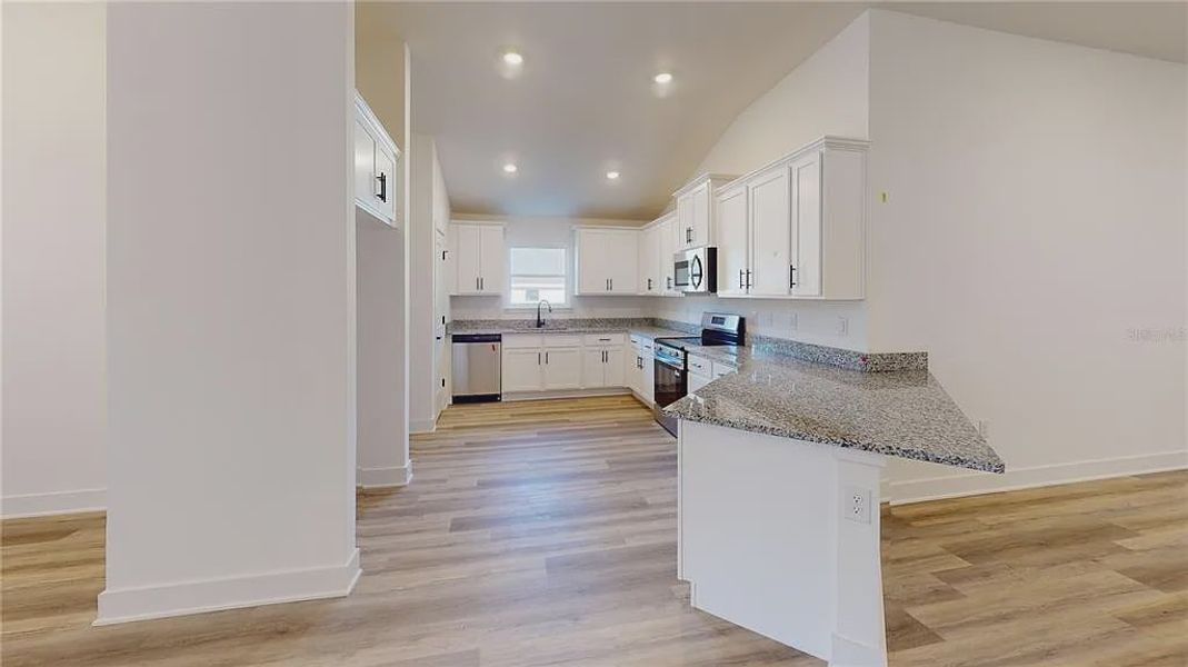 Furnished interior view inside a new home in Briarwood, Alachua (Image 10).