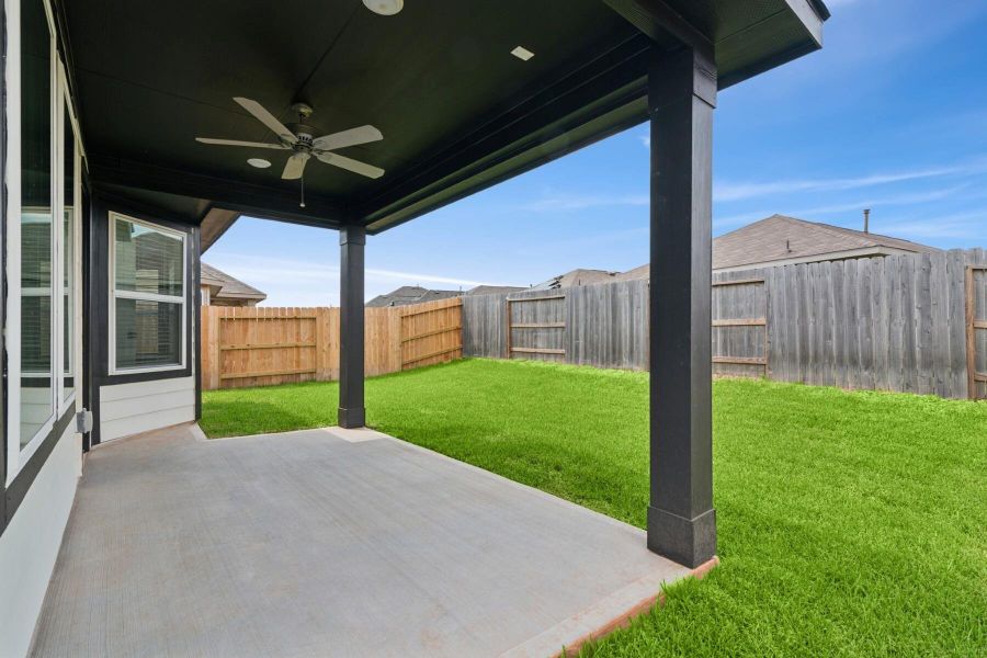 Front exterior of a new home in Moran Ranch, Willis, TX, highlighting curb appeal (Image 6). Front exterior of a new home in Moran Ranch, Willis, TX, highlighting curb appeal (Image 6).