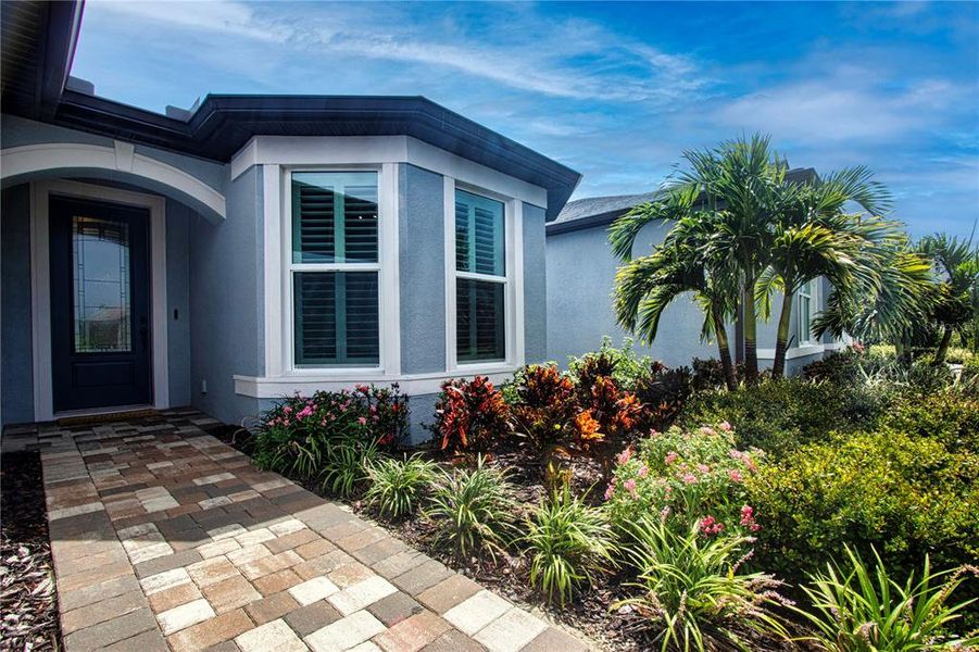 Exterior details and patio area of a home in , Parrish (Image 3).