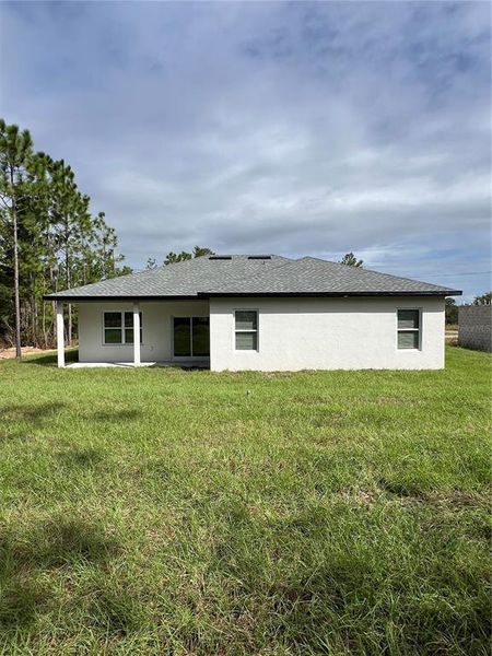 Exterior details and patio area of a home in , Dunnellon (Image 11).