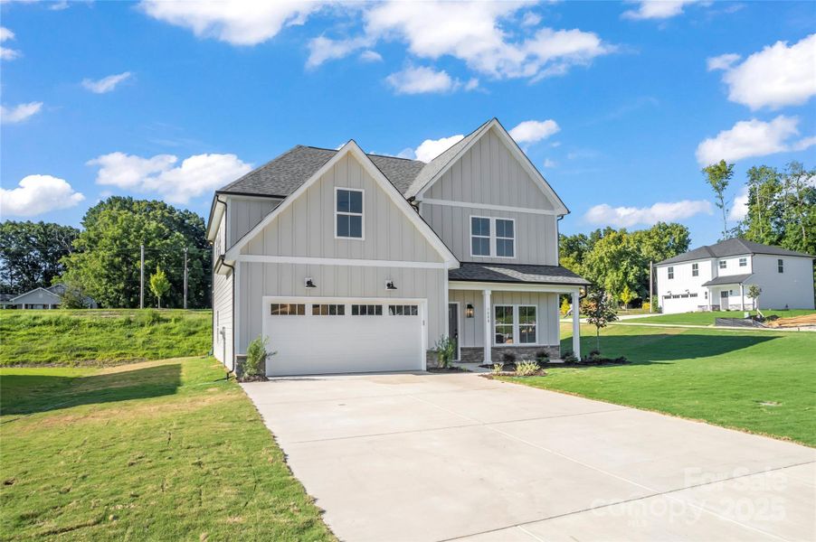 Front exterior of a new home in , Kannapolis, NC, highlighting curb appeal (Image 17).