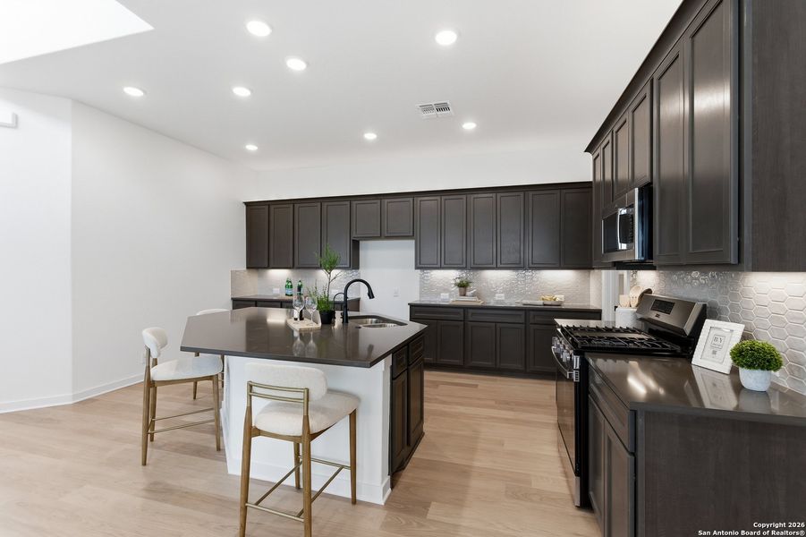 Furnished interior view inside a new home in The Crossvine, Schertz (Image 30).