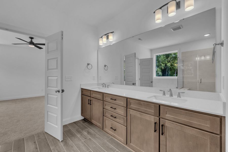 Representative furnished interior of a home built from the The Hampton by RobuckHomes in Kennebec Crossing, Angier (Image 80). Representative furnished interior of a home built from the The Hampton by RobuckHomes in Kennebec Crossing, Angier (Image 80).
