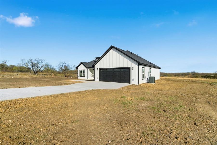 Front exterior of a new home in , Joshua, TX, highlighting curb appeal (Image 2).
