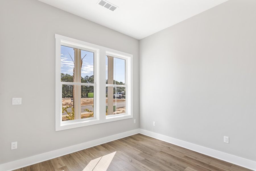 Representative unfurnished interior of a home built from the Pearl by Brock Built in Nautilus Pointe, Inlet Beach (Image 40).