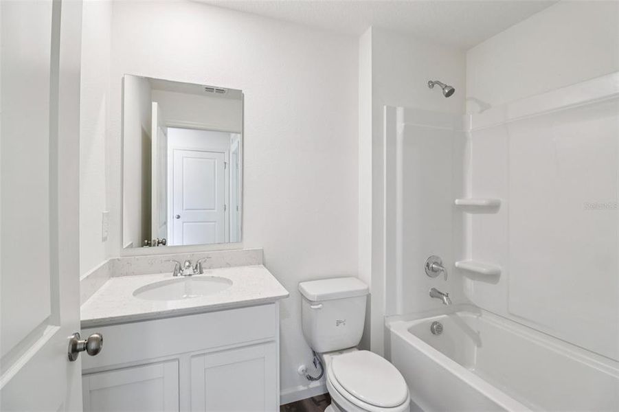 Furnished interior view inside a new home in Sumter Villas, Sumterville (Image 10).