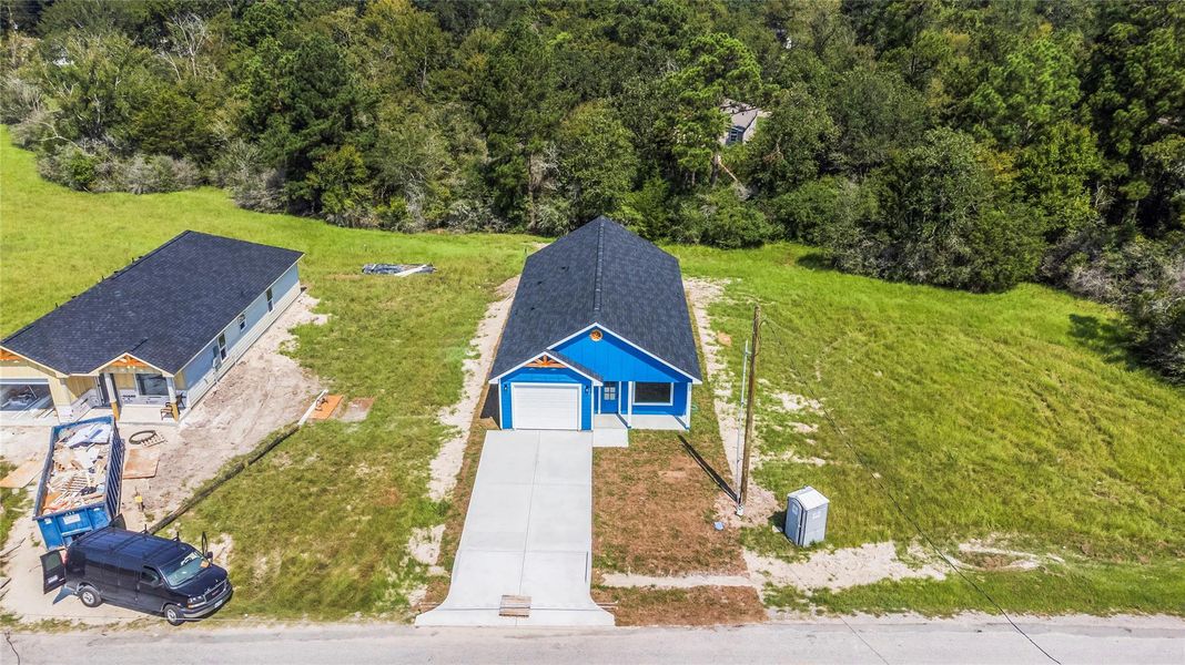 Front exterior of a new home in , Trinity, TX, highlighting curb appeal (Image 1). Front exterior of a new home in , Trinity, TX, highlighting curb appeal (Image 1).