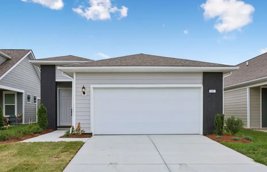 Front exterior of a new home in Del Webb Barton Village, Lebanon, TN, highlighting curb appeal (Image 22).