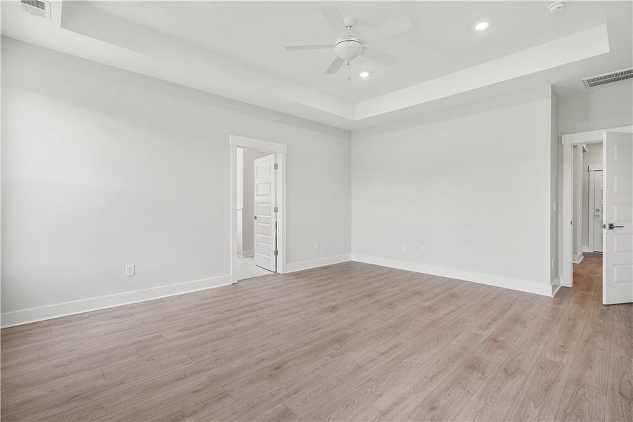 A spacious, naturally illuminated room features li A spacious, naturally illuminated room features li