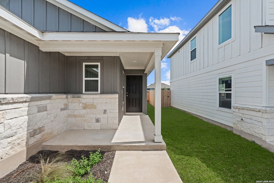 Exterior details and patio area of a home in Dove Song, Marion (Image 3).