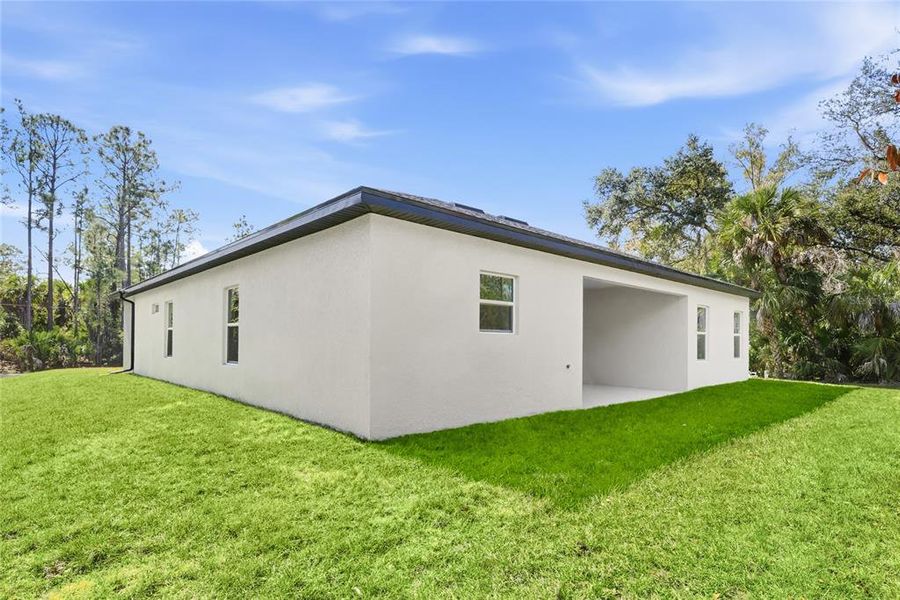 Exterior details and patio area of a home in , North Port (Image 19).