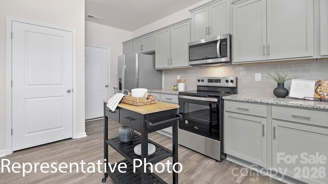 Furnished interior view inside a new home in Fergus Crossing, York (Image 5).