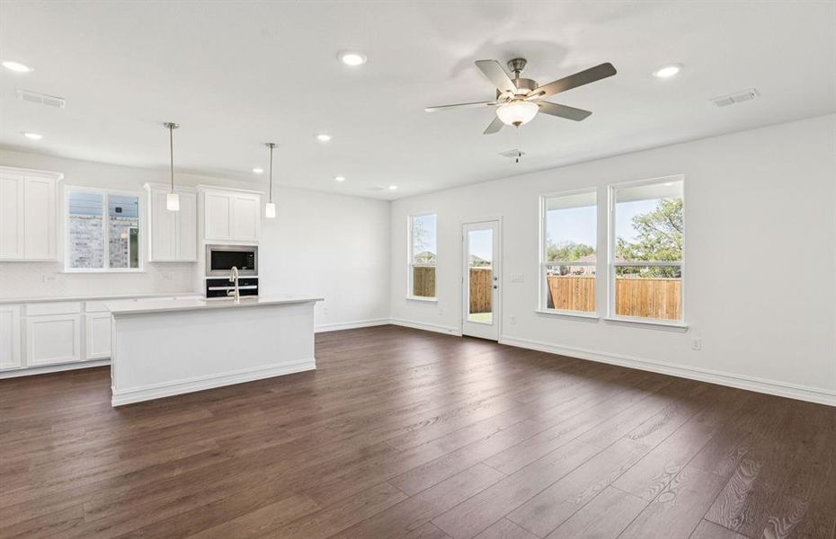 Bright and open gathering space with an adjoining nook Bright and open gathering space with an adjoining nook