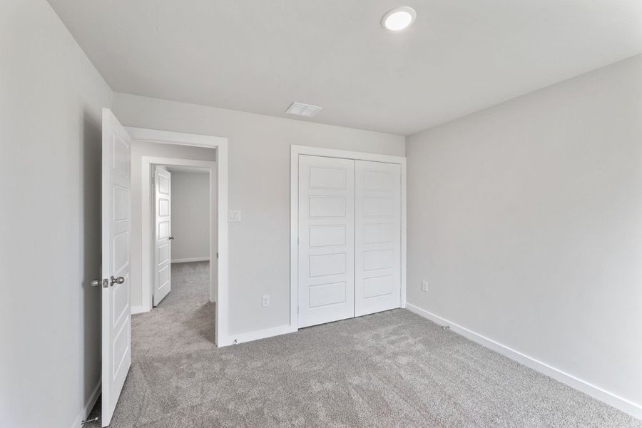 Representative unfurnished interior of a home built from the Alto by Hakes Brothers in The Woodlands, Mico (Image 13).