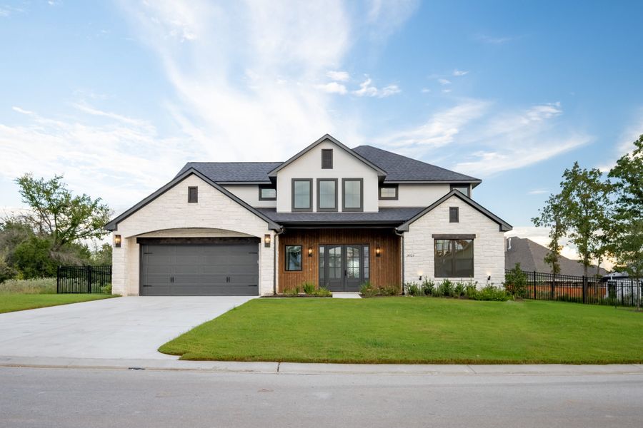 Representative exterior photo of a completed home built from the The Stella by Reece Homes in Traditions, Bryan, TX (Image 30).