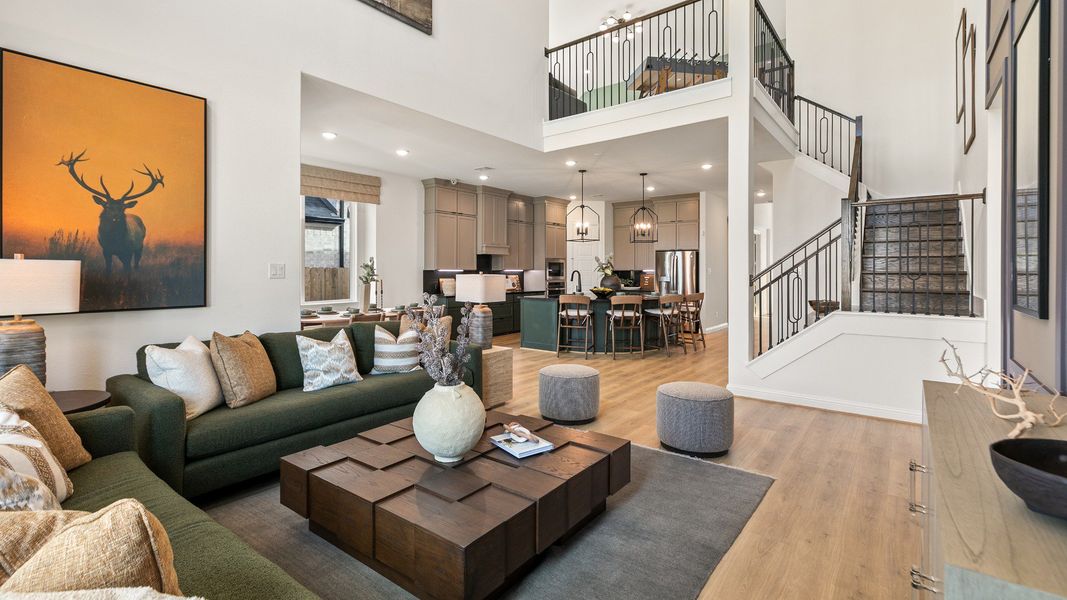 Representative furnished interior of a home built from the Rosewood by Brightland Homes in Sunterra, Katy (Image 13).