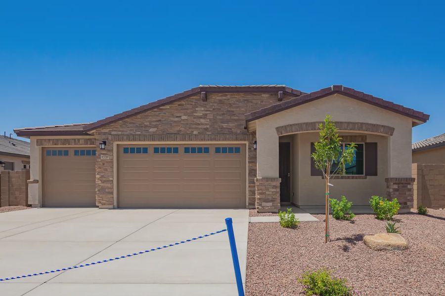 Front exterior of a new home in Forté at Granite Vista, Waddell, AZ, highlighting curb appeal (Image 24).