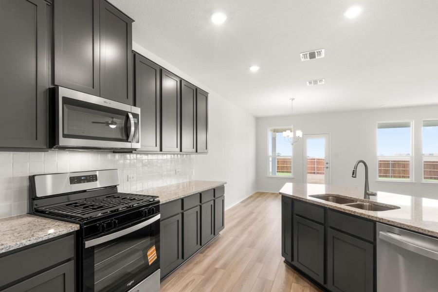 Furnished interior view inside a new home in Salerno - Classic Collection, Round Rock (Image 11).