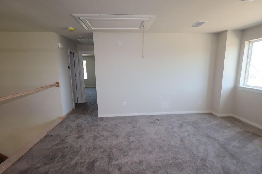Spacious, unfurnished interior of a new home in Sundance Cove Lakeside - Overlook View Collection, Crosby (Image 8).