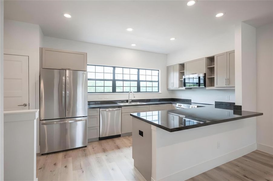 bright and functional kitchen with soft close cabinet and stainless steel appliances bright and functional kitchen with soft close cabinet and stainless steel appliances
